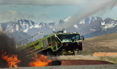 Firefighting truck and flames