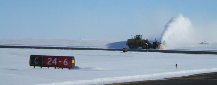 Plowing snow at the Barrow Airport
