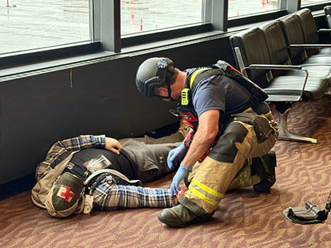 Triennial response exercise showing a pretend victim and a responder