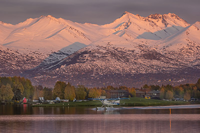 A Cessna based at Lake Hood lands and taxi to its mooring in the Fingers at the Seaplane base near Ted Stevens Anchorage International Airport