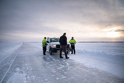 photo: Governor Mike Dunleavy with the Kuskokwim Ice Road Maintenance Crew