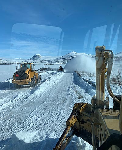 Photo: Maintenance crew from Paxson works to open the Denali Highway at Rock Creek near mile 25