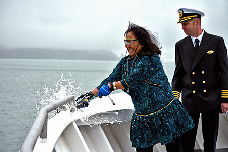 First Lady Rose Dunleavy christens MV Hubbard with Ethan Waldvogel, Hubbard Relief Captain. Photo by Dawn Millen, AMHS.