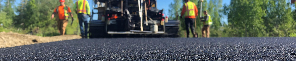 New pavement goes down on South Peger Road in Fairbanks during the 2021 construction season. Photo by Chris Plutt