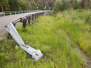 image of a damaged guardrail