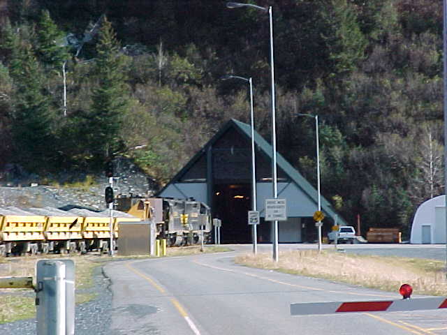 Alaska Railroad train entering Bear Valley portal building