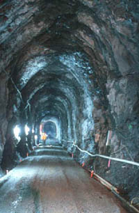 Interior of tunnel: preparing base material for roadway/rail panel. 
