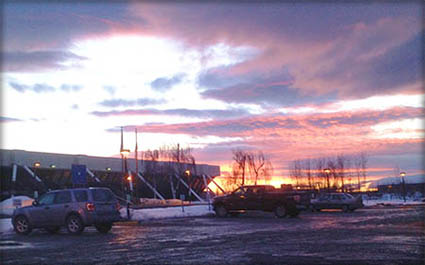 photo: Sunset at the "upside-down building" in Anchorage