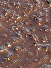 close-up image of asphalt surface