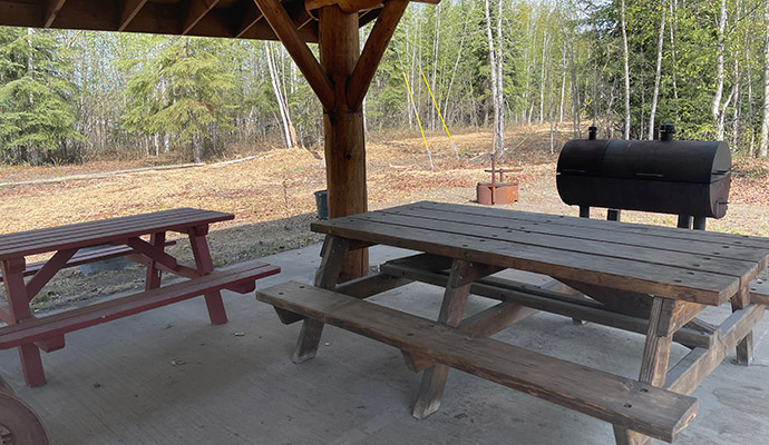 Photo of picnic tables at the airpark, the long term parking area with facilities at Fairbanks International Airport