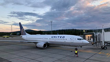 photo United Airlines jet parked at FAI