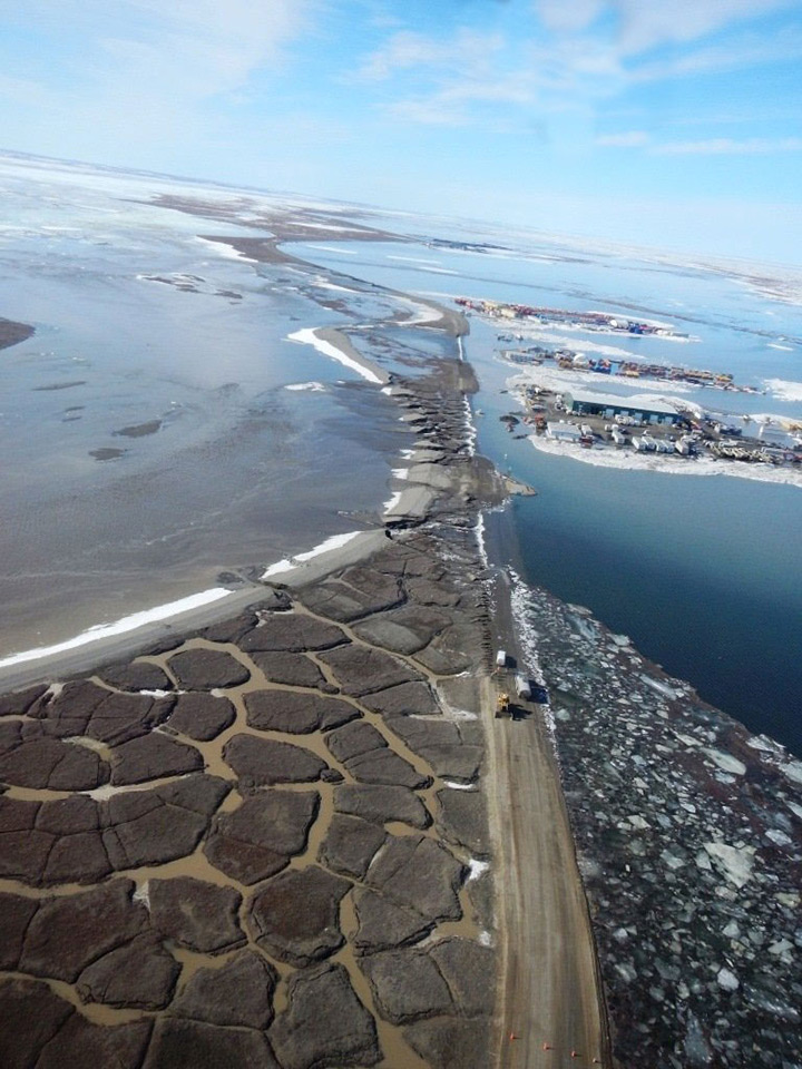 Flooded Dalton Highway and stranded vehicles