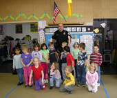 Officer Blain Hatch with kids