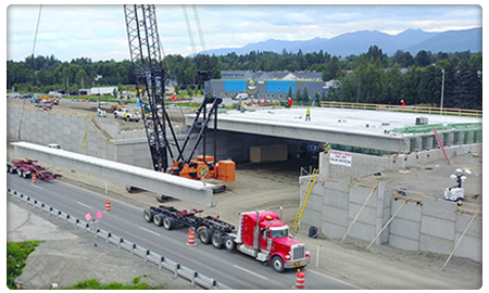 click for larger photo: Setting girders on the 76th/Lore Overpass project, 2017.