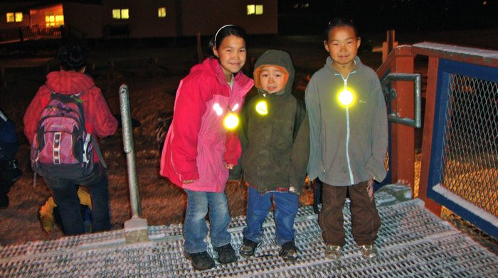 Children wearing reflectors