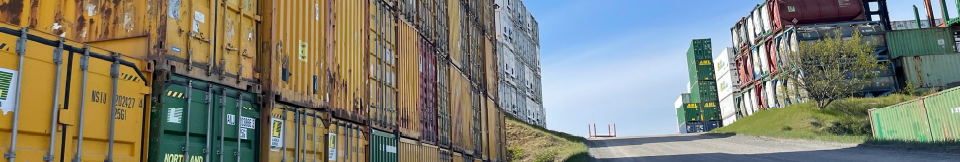 Photo banner with stacked shipping containers
