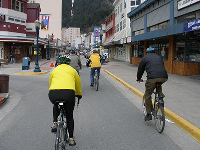 Bicyclists riding along South Franklin Street in downtown Juneau, 2009. Photo credit: Bob Laurie, Alaska DOT&PF