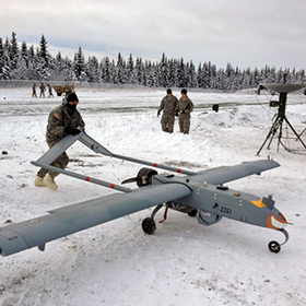 image of soldiers about to launch a large fixed wing drone with GPS